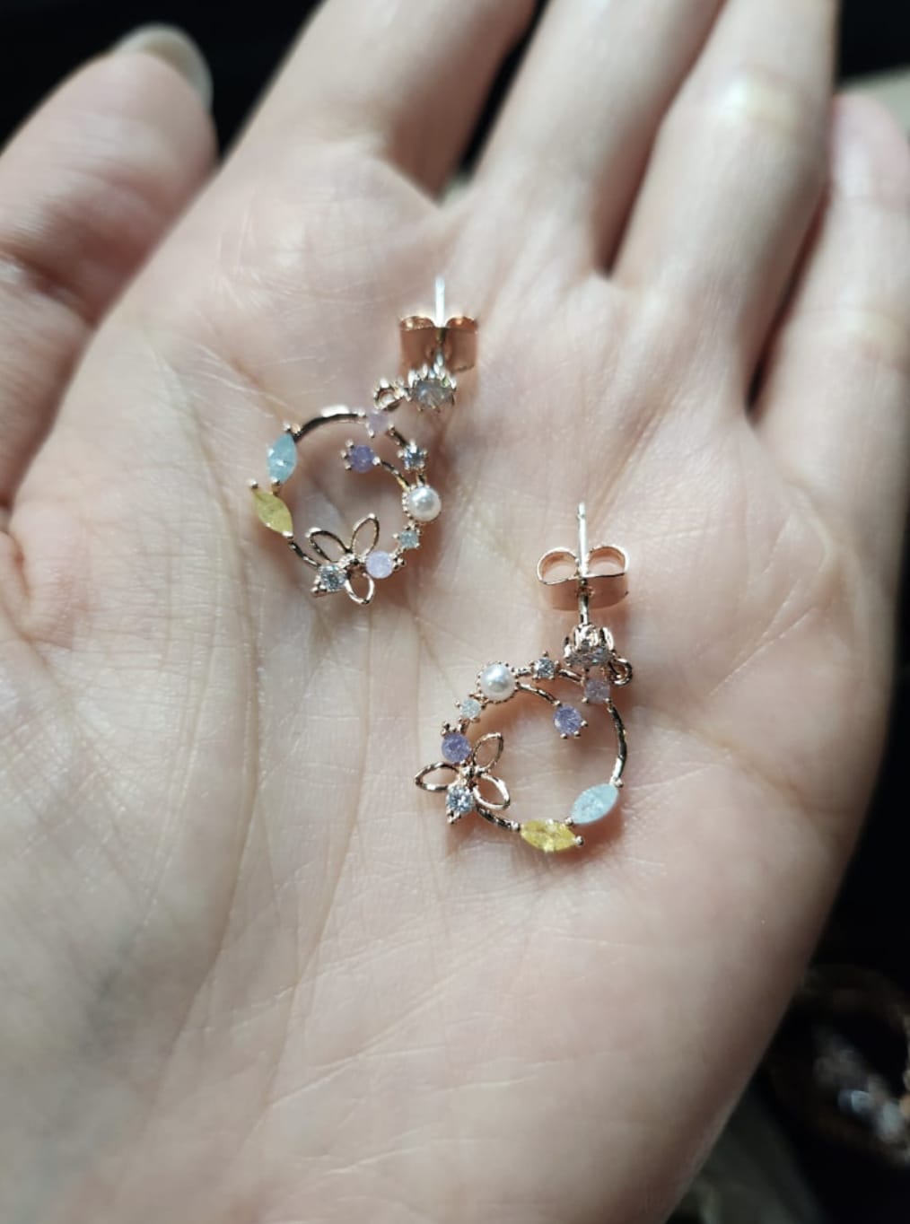 Customer photo review of Rose Gold Eustoma Earrings