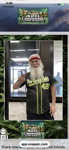 Customer wearing a custom black pinstripe baseball jersey with 'Pure Cannabis Outlet' and '420' on it.