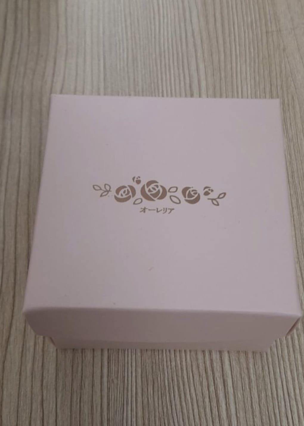 Customer photo review of Rose Gold Love Moon Rose Earrings