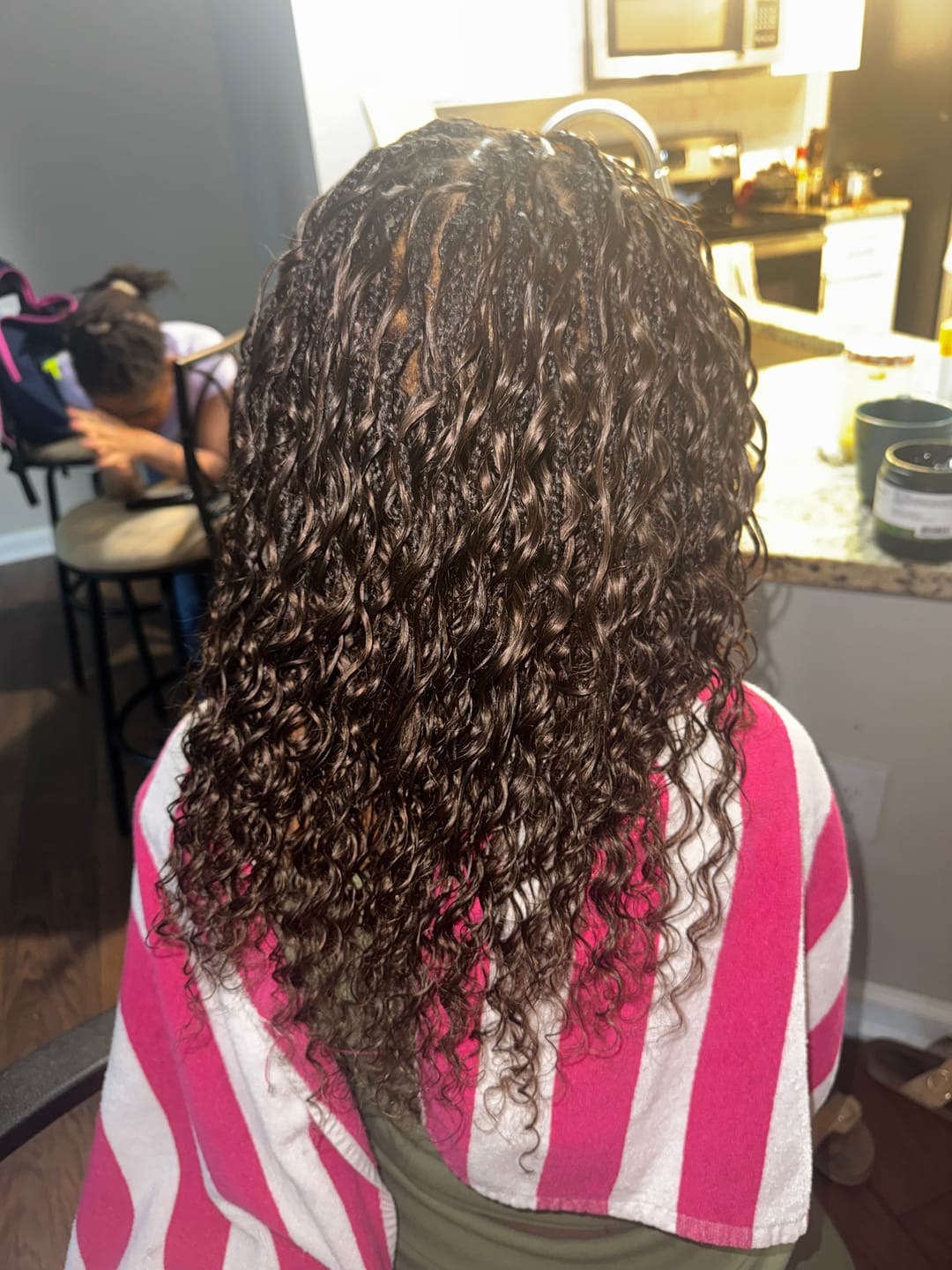 Customer photo review of #4 Medium Brown Deep Wave Human Crochet Hair for Braiding