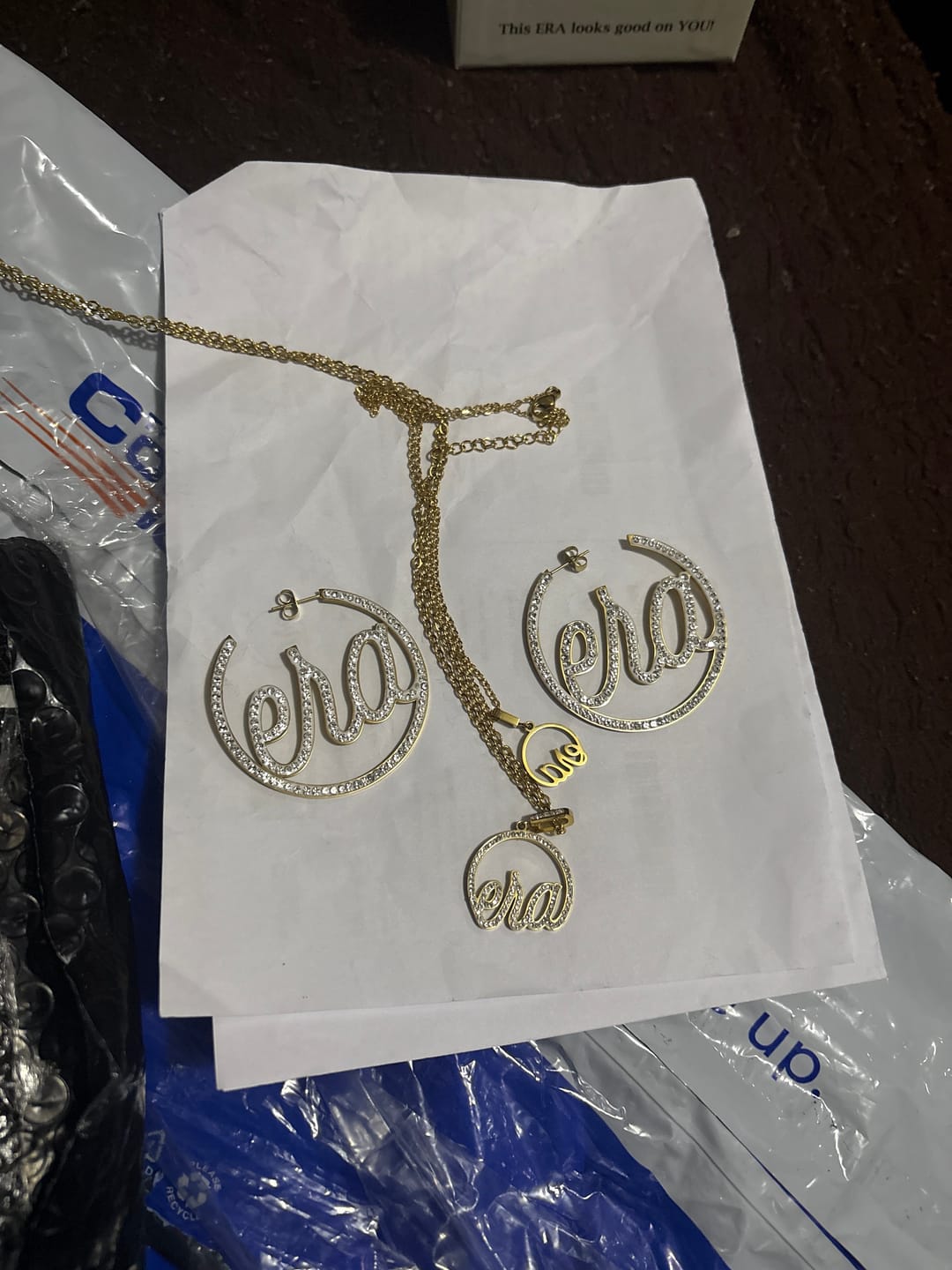 Customer photo review of Silver Luxe Logo Hoops