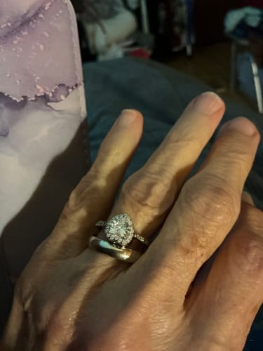 Reviewer showing the Forever In My Heart Urn Ring on their finger, stacked with another band.