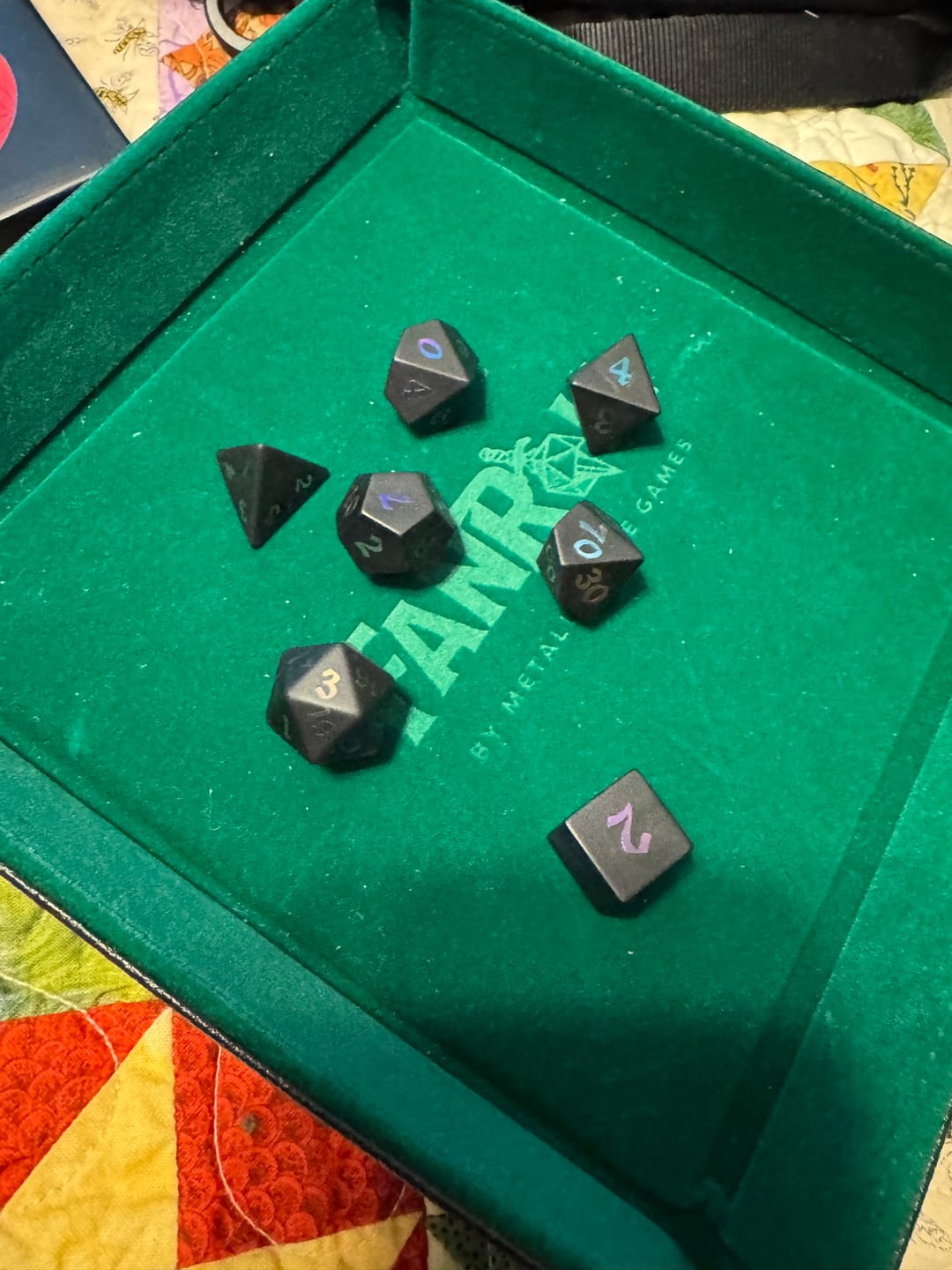 Customer photo review of Inked Black Night Raised Obsidian Hand Carved Dice DND Set