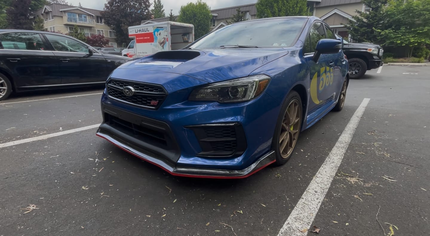 Customer photo review of 2015-2021 Subaru WRX STI VA - Front Lip - Carbon Print w/ Red Trim