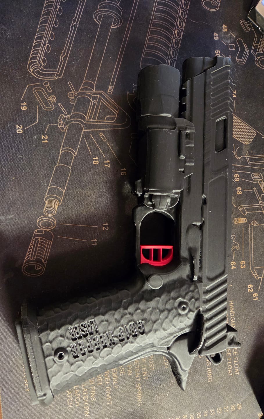 Customer photo review of Grip Keeper Laser Trainer – Trigger-Activated Laser Training Pistol