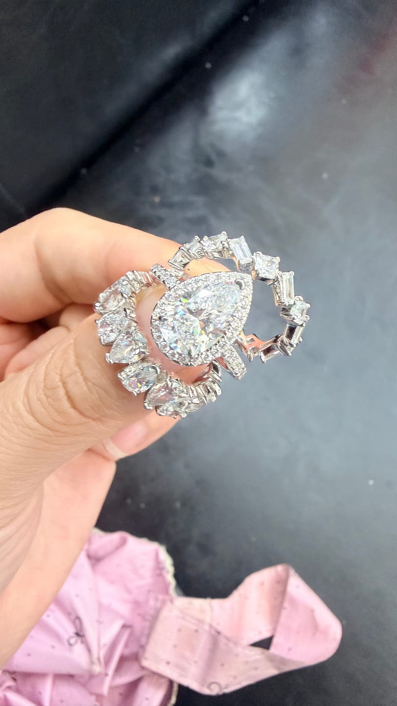 Customer photo review of S925 2.2 Carat Halo Pear Cut Wedding Ring Set With Two Luxurious Wedding Bands For Women