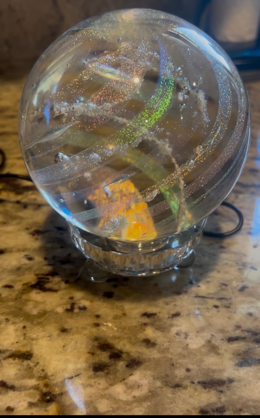 Customer photo review of Illuminated Dichroic Rainbow Orb with Cremains