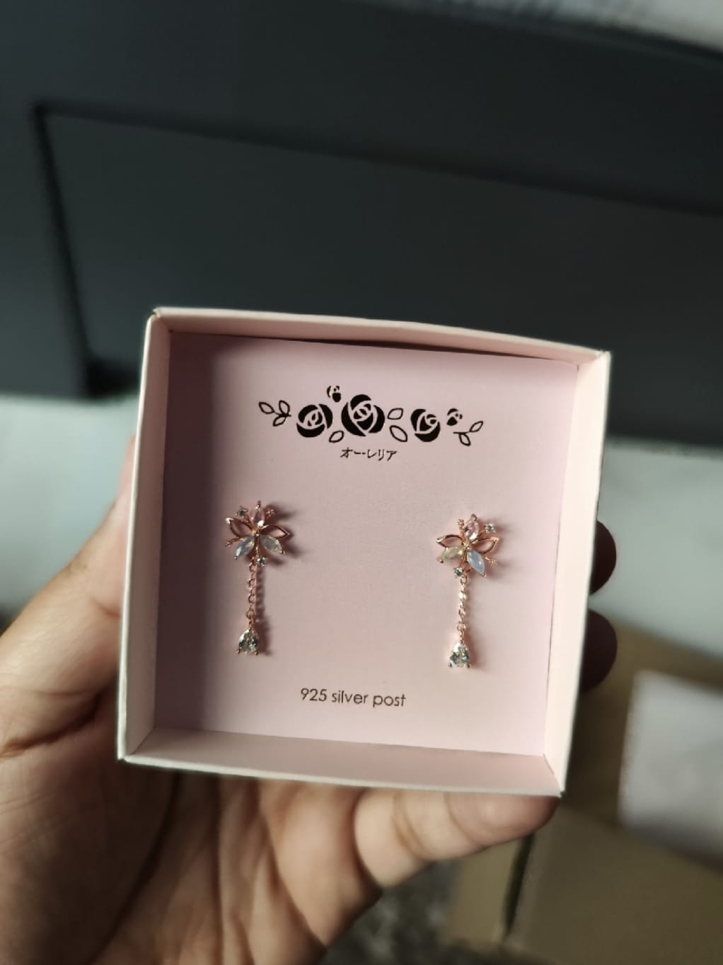 Customer photo review of Rose Gold Dandelion Earrings