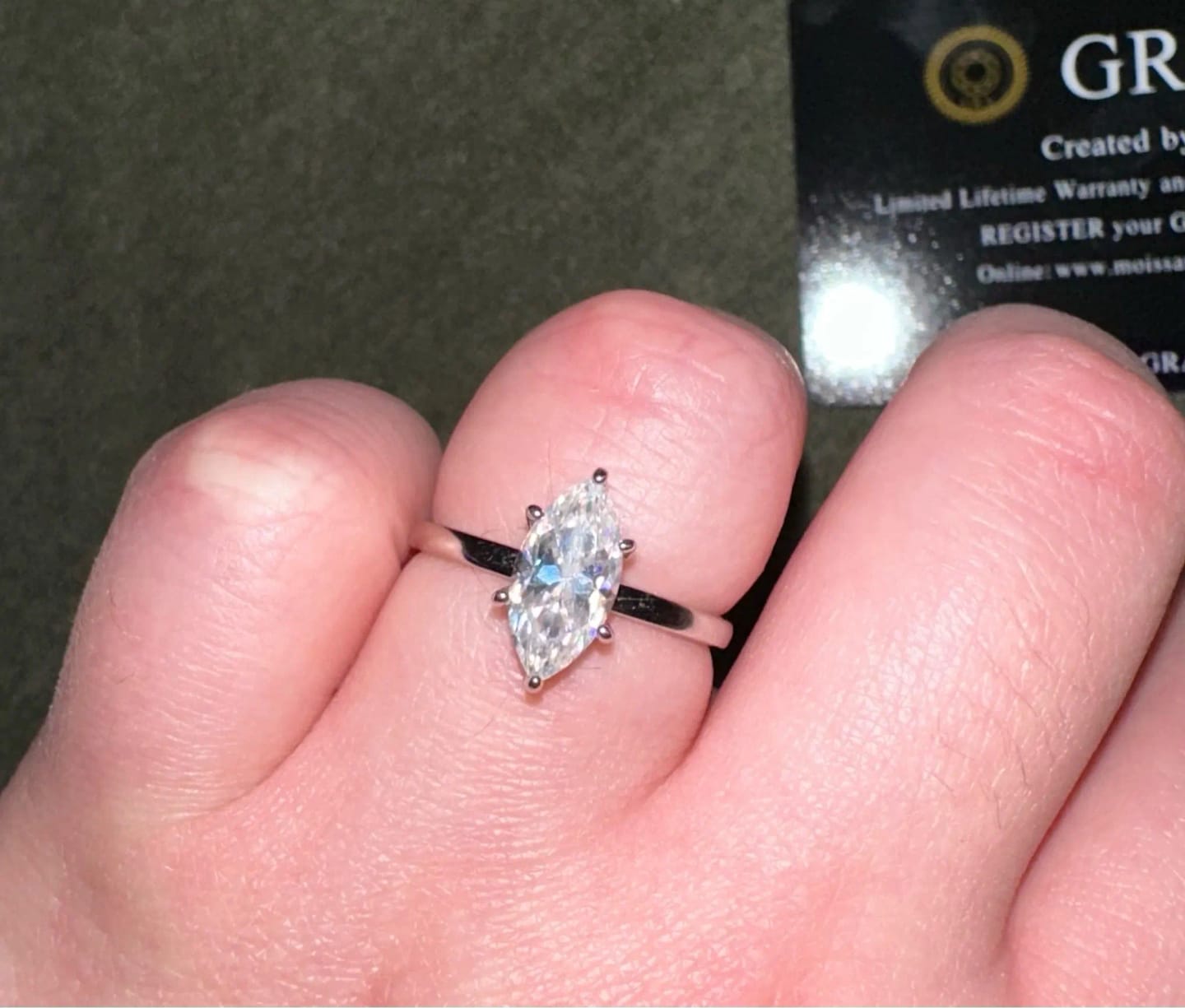 Customer photo review of 2 Carat Marquise Cut Solitaire Moissanite Ring