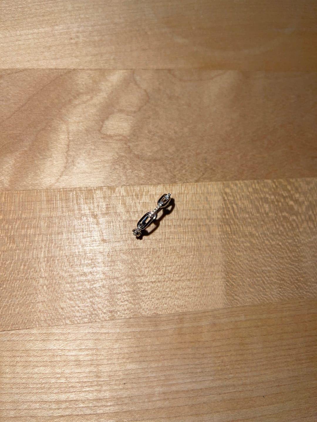 Customer photo review of MOISSANITE ICED CHAIN RING.