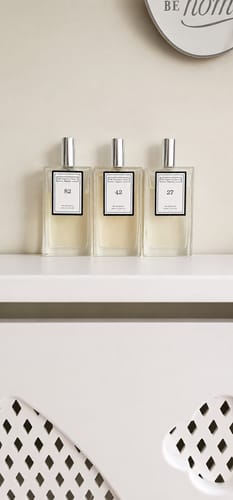 Customer's 100ml x3 Perfume Set neatly displayed on a white shelf.