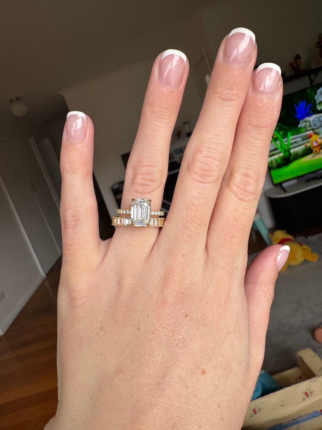 Customer photo review of Louily Classic Emerald Cut Women's Wedding Band for Gifts