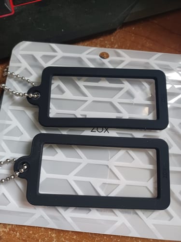 Reviewer's Cardlox 2-Pack of two black silicone keychain holders shown on their packaging.