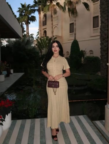 Customer photo review of Beatrice Sequin Knit Maxi Dress