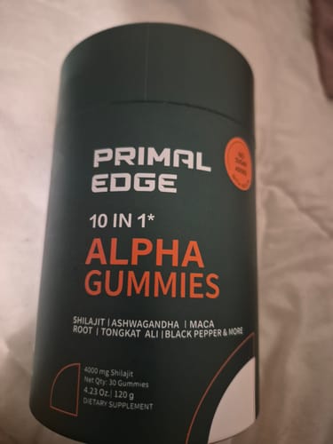 Reviewer's photo of the dark green container for PrimalEdge 10-in-1 Alpha Gummies.