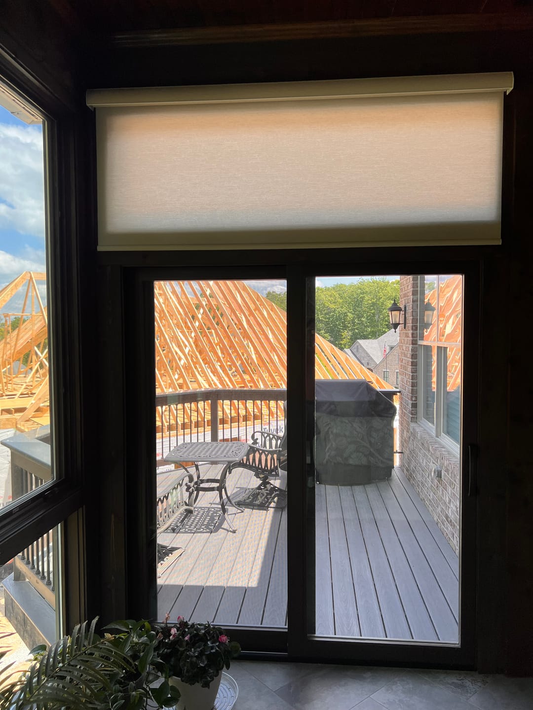 Customer photo review of SmartWings Motorized Light Filtering Roller Shades 70% Blackout Safari