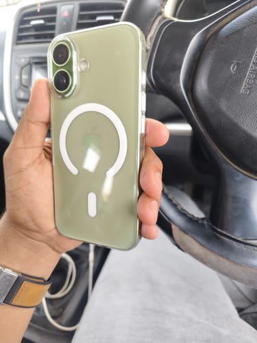 Customer's hand holding a green iPhone with the Anti Yellow Magsafe Clear Case, showing the MagSafe feature.