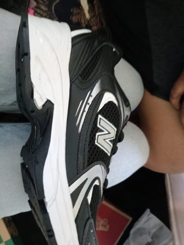 Customer photo review of Tenis 275 Blanco Negro
