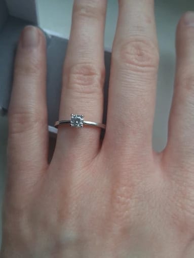 Customer photo review of Petite Round Cut Solitaire Moissanite Ring