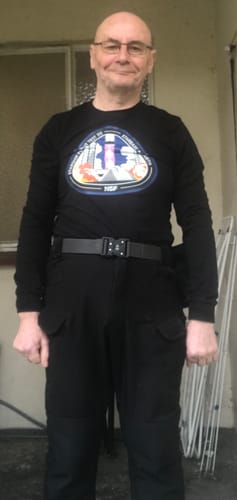 Reviewer wearing the black Starship Flight 12 Unisex Long Sleeve t-shirt, providing a full-length view.