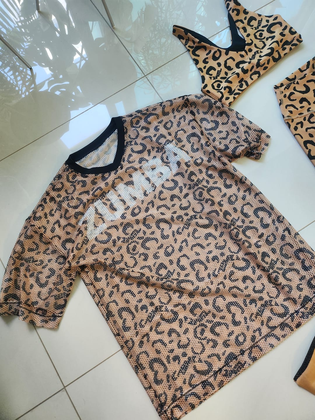 Customer photo review of Zumba Wildbeat Oversized Mesh Top