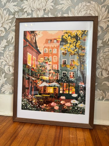 Customer's completed Urban garden Paint by Number painting, framed and displayed against a wall.