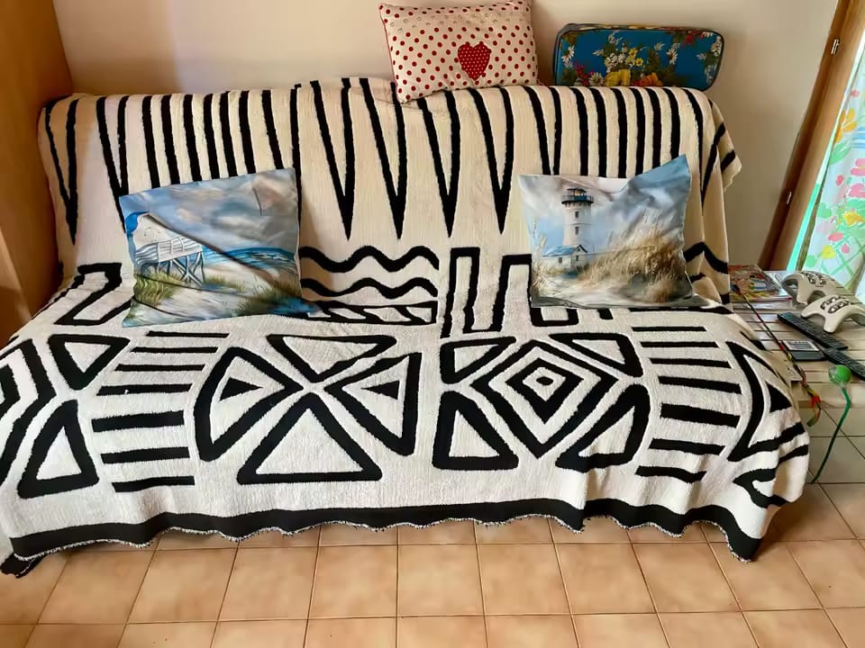 Customer photo review of Velvet Sofa Cover – Geometric Jacquard Protector