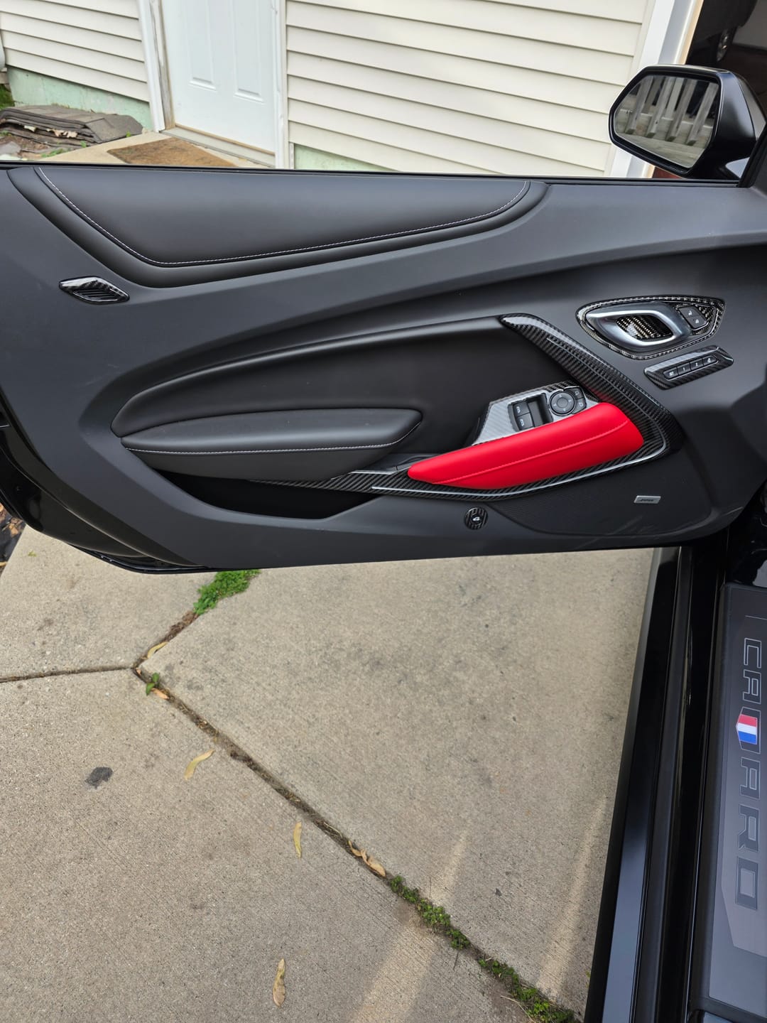 Customer photo review of 2016-2024 Camaro Real Carbon Fiber Interior Door Panel Chrome Trim Cover