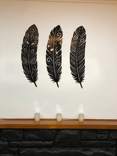 Customer photo review of Detailed Huia Feather Trio