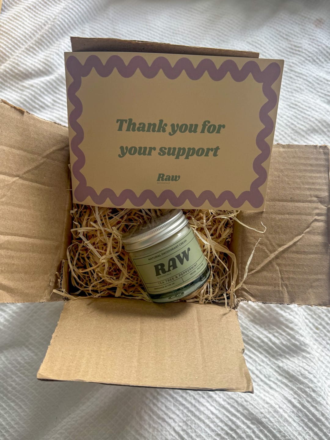 Customer photo review of RAW Botanicals Natural Deodorant Cream – Tea Tree & Peppermint
