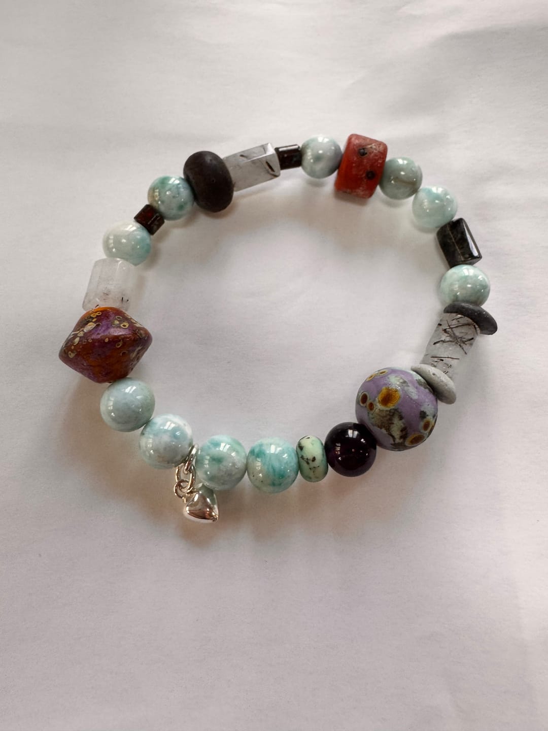 Customer photo review of 8-9mm Dominican Larimar,  Round Natural Larimar Gemstone Strands, 15.5inch, about 48 beads, 1mm hole