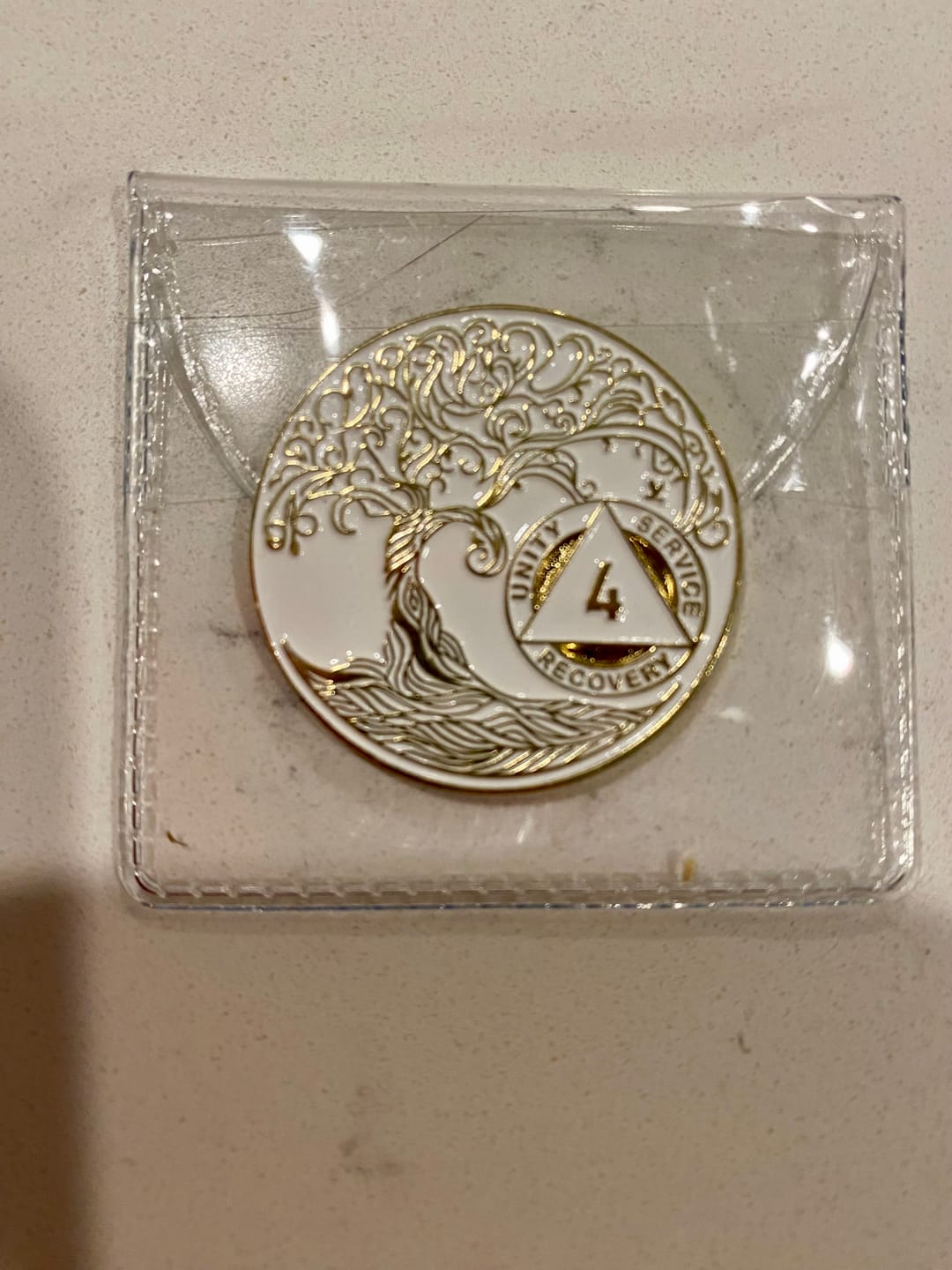 Customer photo review of 4 Year Sobriety Mint Twisted Tree of Life Gold Plated AA Recovery Medallion - Four Year Chip/Coin - White