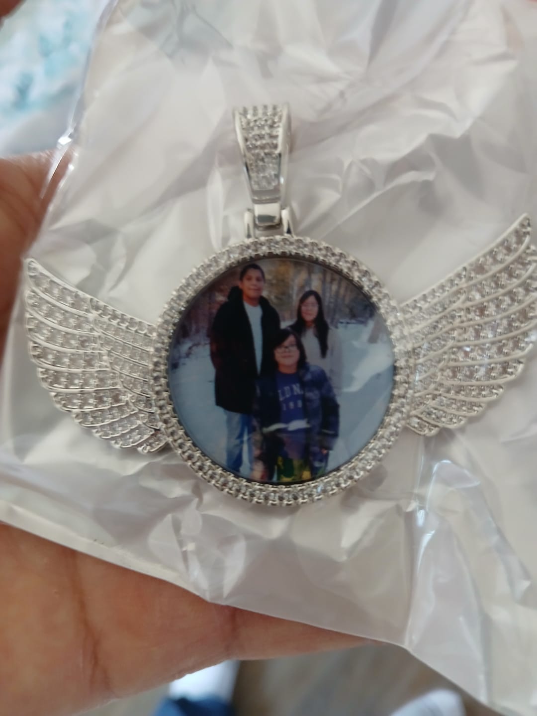 Customer photo review of Diamond Studded Angel Wing Photo Necklace