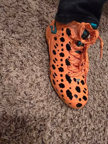 Customer photo review of The Flintstones "Bedrock Blitz" Cleats — Quantum Speed by Phenom Elite