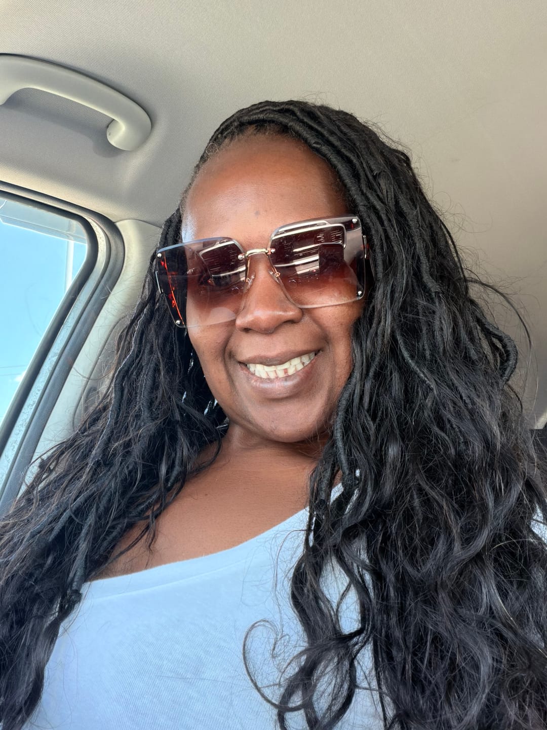 Customer photo review of Pre-looped Crochet Boho Locs with Body Wave Virgin Human Hair Curls