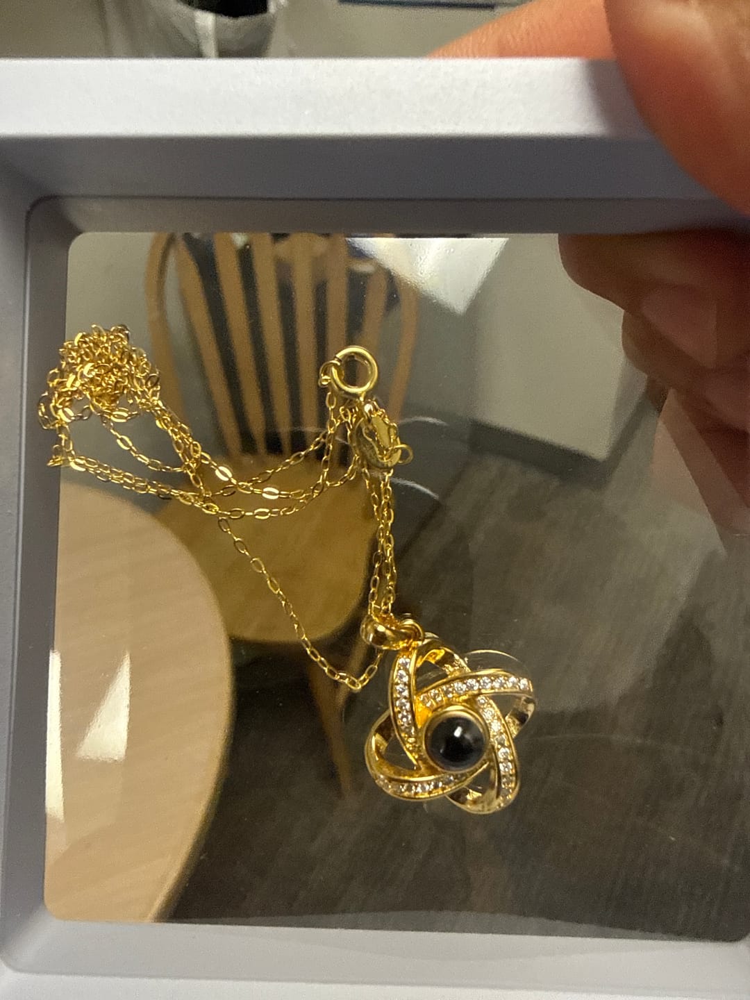 Customer photo review of Personalized Photo Projection Necklace