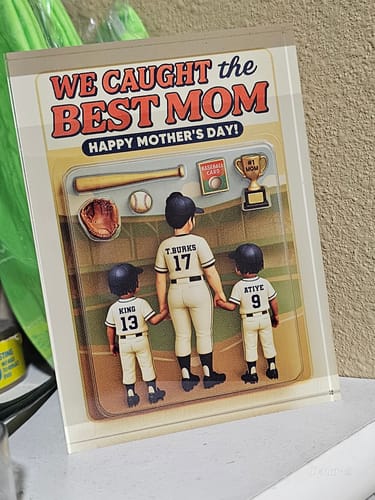 Customer's 'We Caught the Best Mom' personalized acrylic plaque showing figures of a mom and two kids in baseball uniforms.