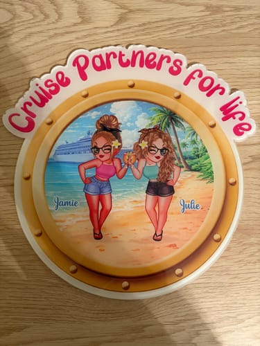 Customer's personalized porthole magnet with "Cruise Partners for life" text and a beach scene of two women.