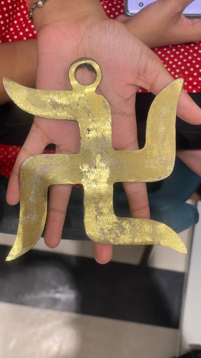 Customer photo review of Brass Swastik – Vastu Remedy for Home Protection | Main Door Dosh Nivaran | 6 & 9 Inch