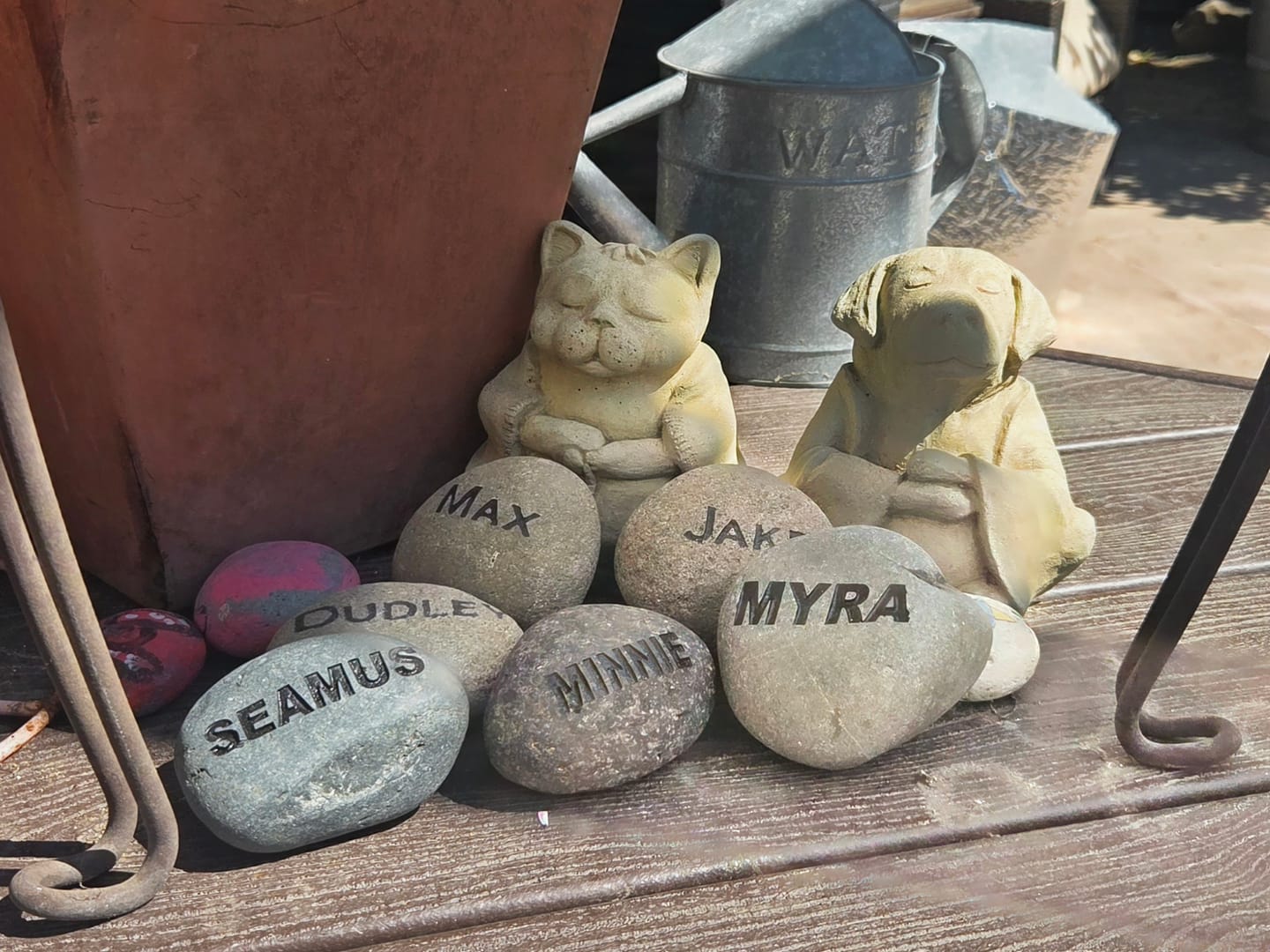 Customer photo review of Dog headstones Grave Marker Custom Engraved Pet Memorial River Rock Stone Heart Paw Print
