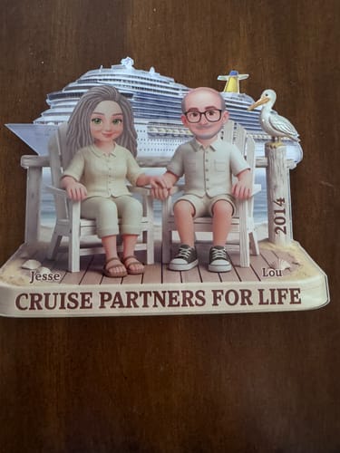 Customer's personalized cruise magnet showing a cartoon couple on a deck, a cruise ship, and the text 'CRUISE PARTNERS FOR LIFE'.
