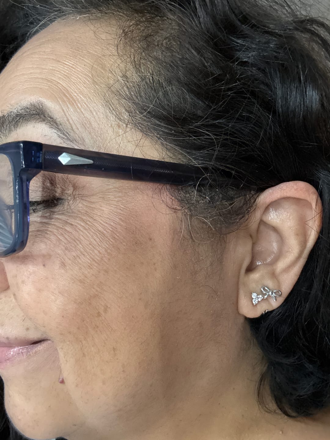 Customer photo review of Coco Bow Comfort Earrings — Silver