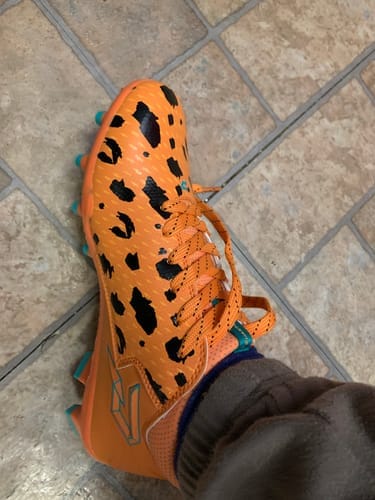 Customer photo review of The Flintstones "Bedrock Blitz" Cleats — Quantum Speed by Phenom Elite