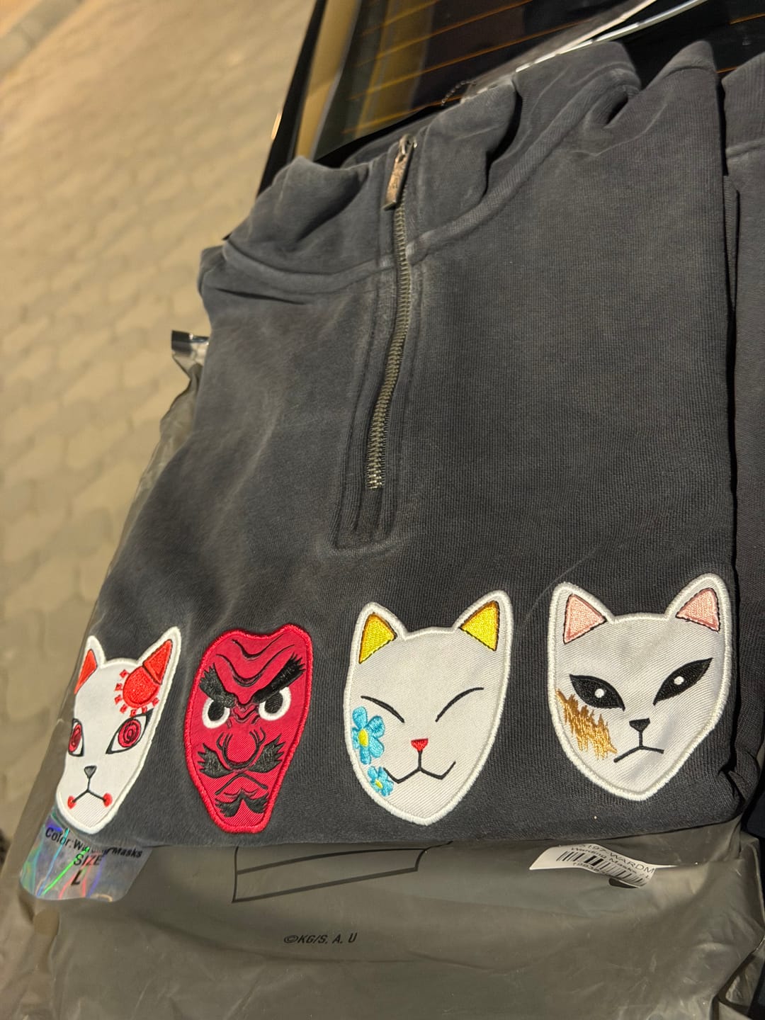 Customer photo review of 5197 - Demon Slayer: Kimetsu no Yaiba - Quarter Zip