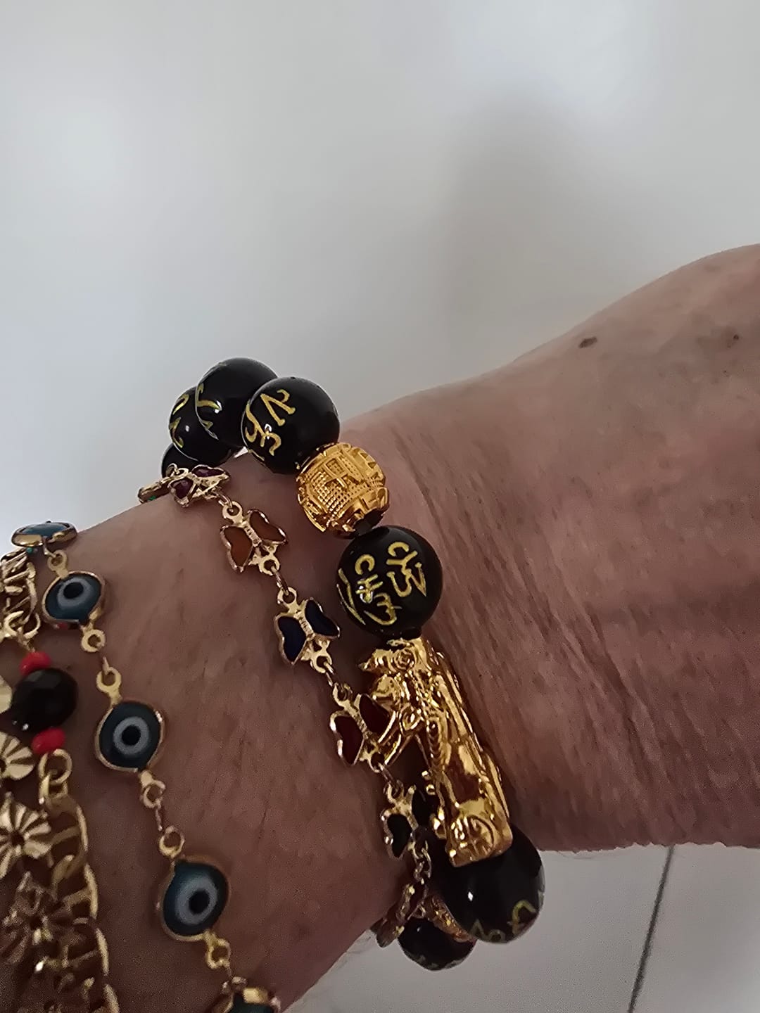 Customer photo review of Double Pixiu Black Obsidian Wealth Bracelet for Men – Feng Shui Money & Protection Good Luck Jewelry (10mm)