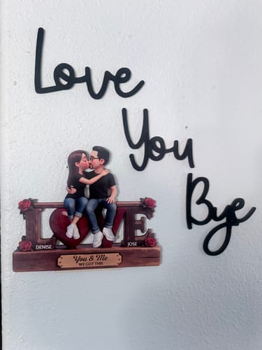 Customer's personalized wooden plaque with 'LOVE' design and a couple, customized with the names 'Denise' and 'Jose'.