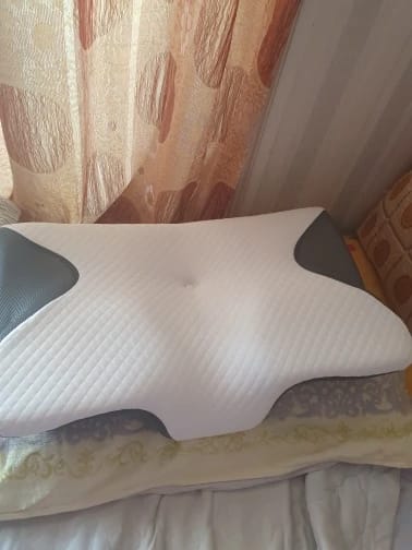 Customer photo review of Almohada cervical ergonómica