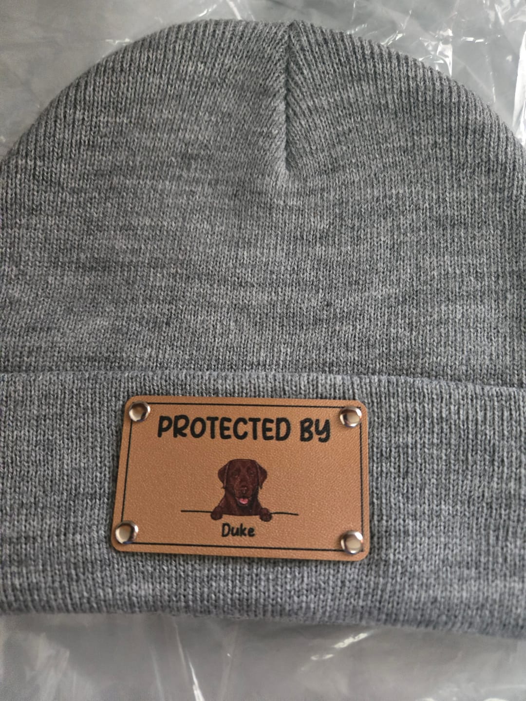 Customer photo review of Personalized Baby Beanie with Vegan Leather Patch for Boy Girl, Custom Baby Puppy Beanies with Name Kids, Gift for Newborn, Toddler, Kid