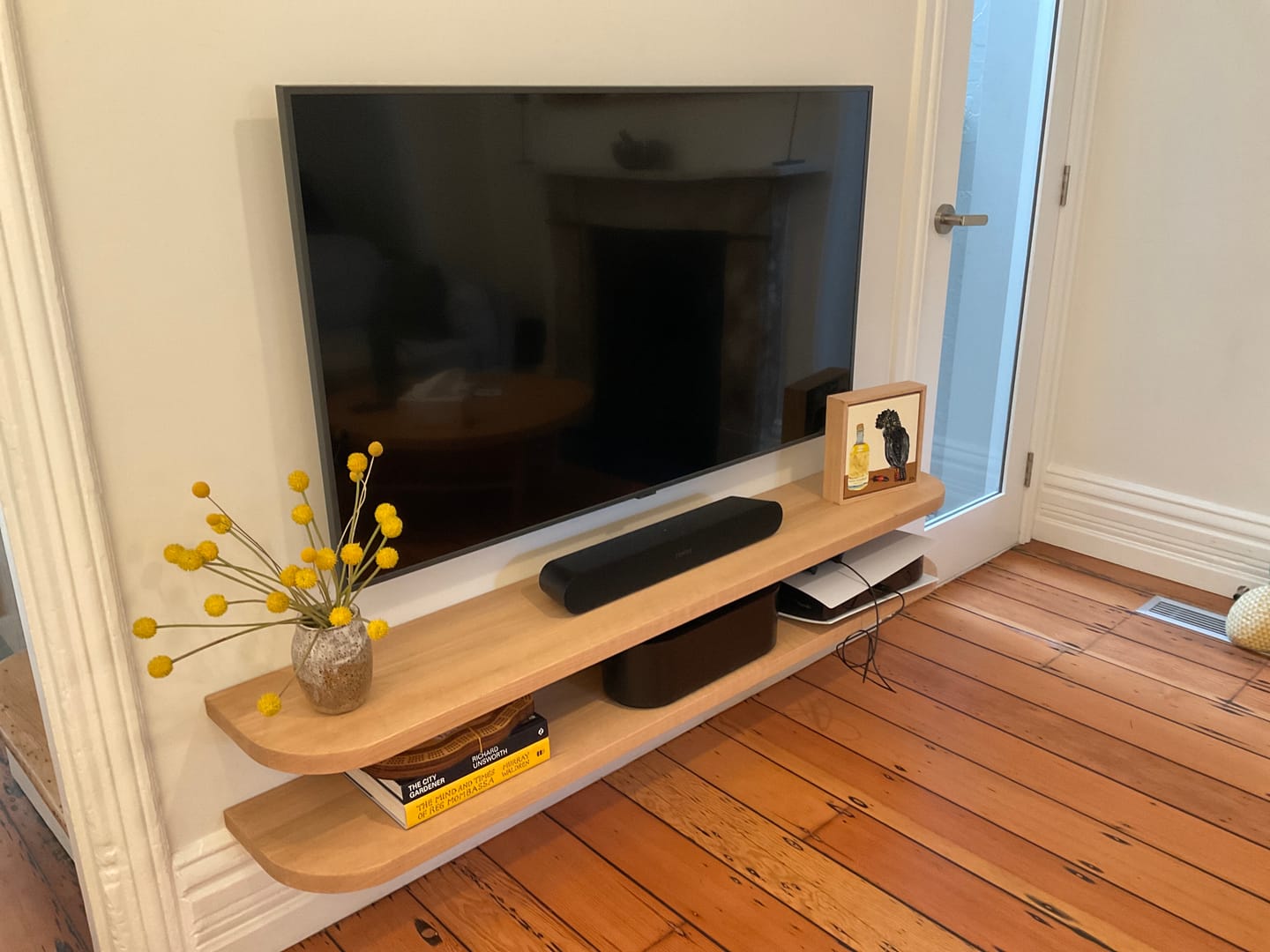Customer photo review of Curved Floating Shelf