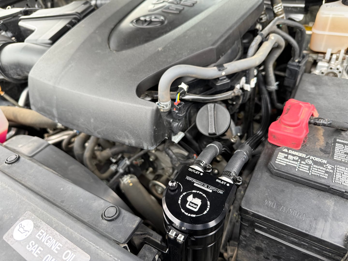 Customer photo review of 2016+ 3.5L V6 Toyota Tacoma Catch Can Kit